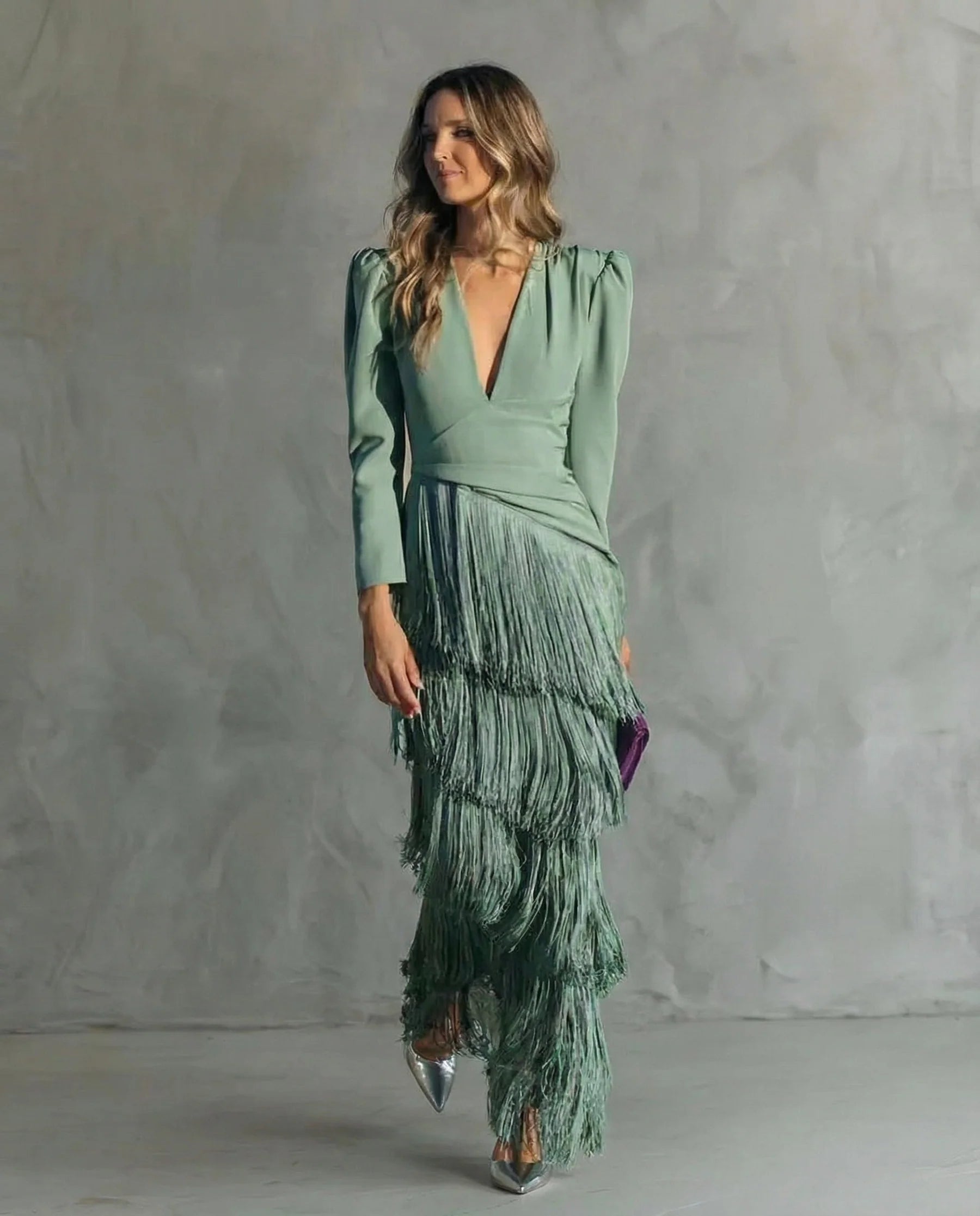 Elegant midi dress with fringe sleeves